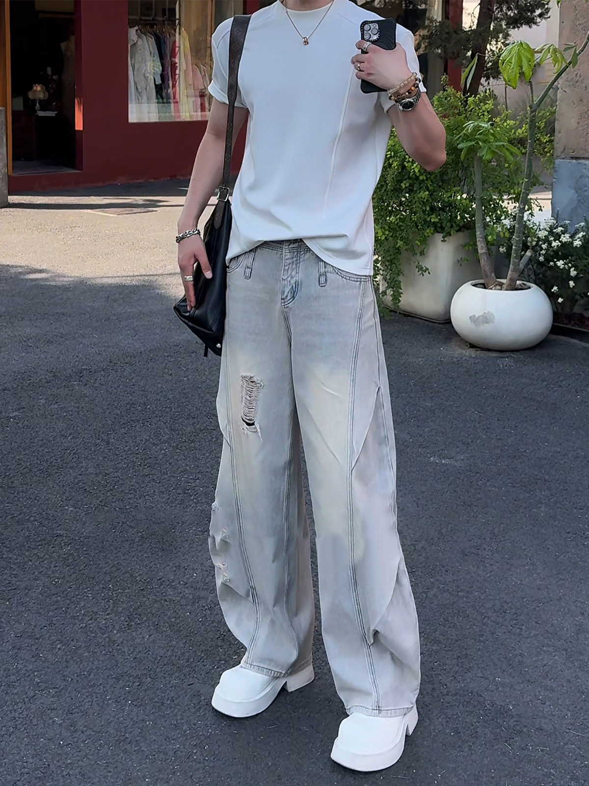 夏季新品设计感水洗破洞牛仔裤男款美式高街弯刀休闲裤直筒长裤子